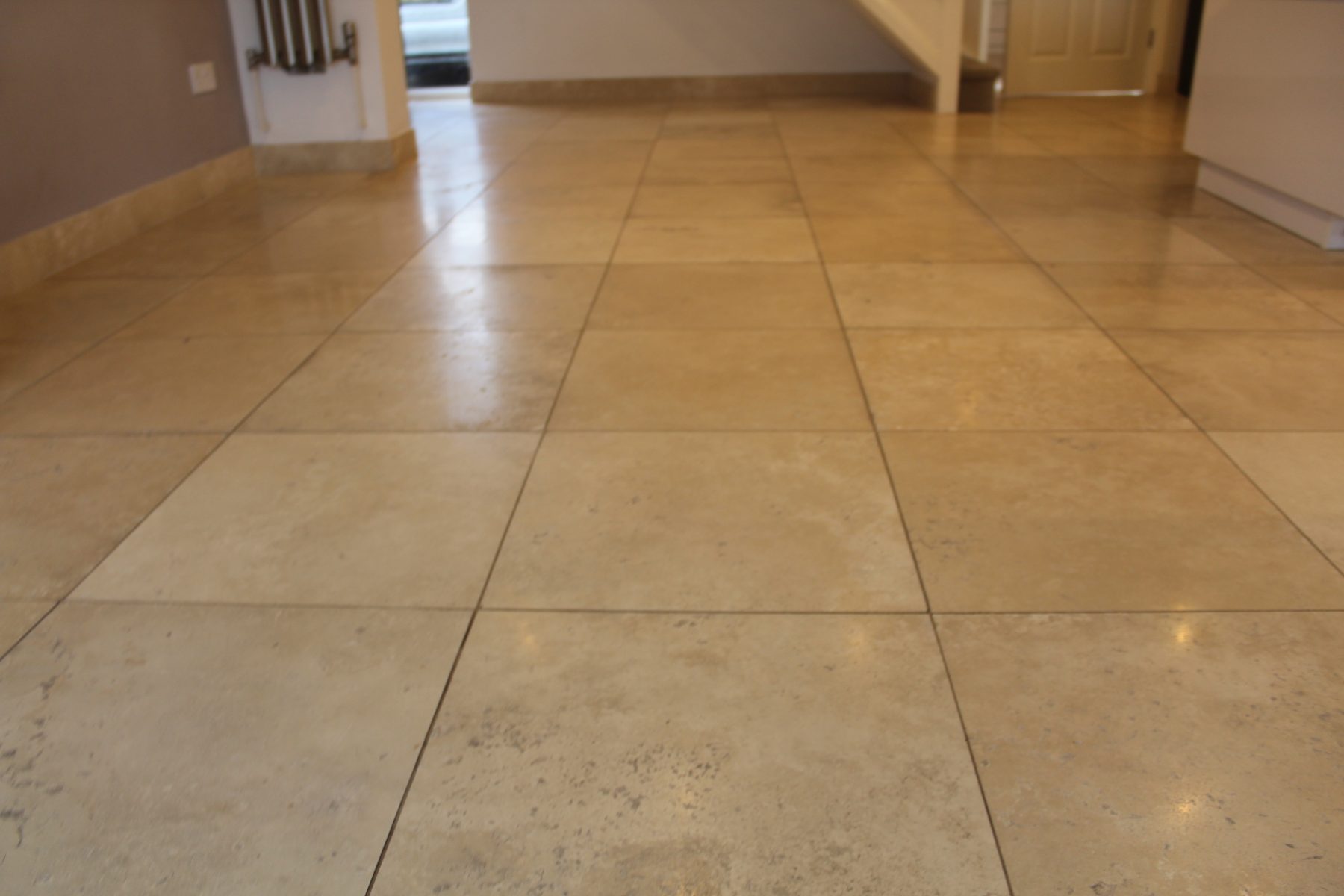 After Travertine polishing in manchster with holes filled and cracks repaired. 