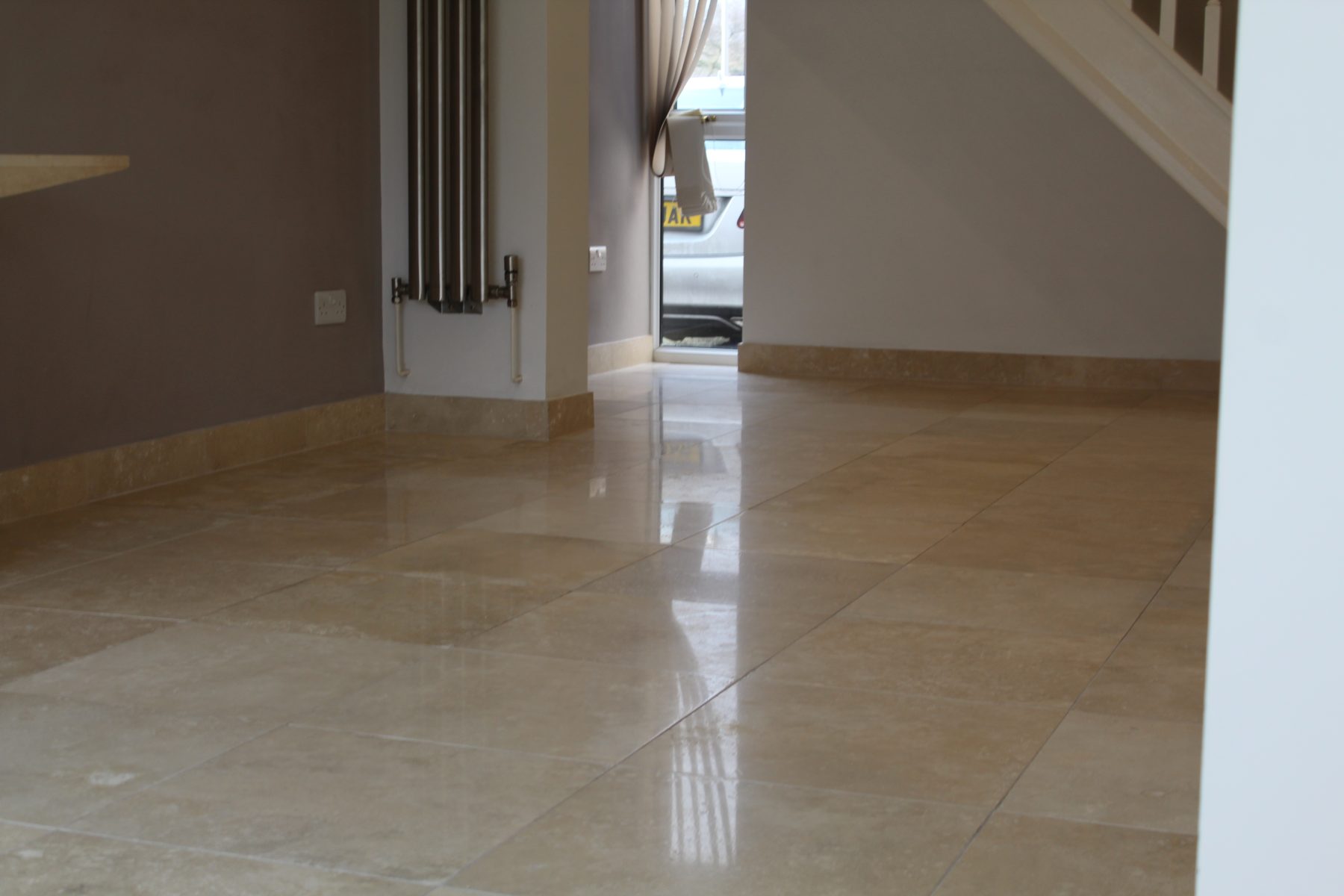 After Travertine polishing in manchster with holes filled and cracks repaired. 