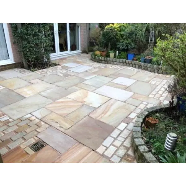 Pristine and clean sandstone patio after HR Total Power Clean patio cleaning treatment.