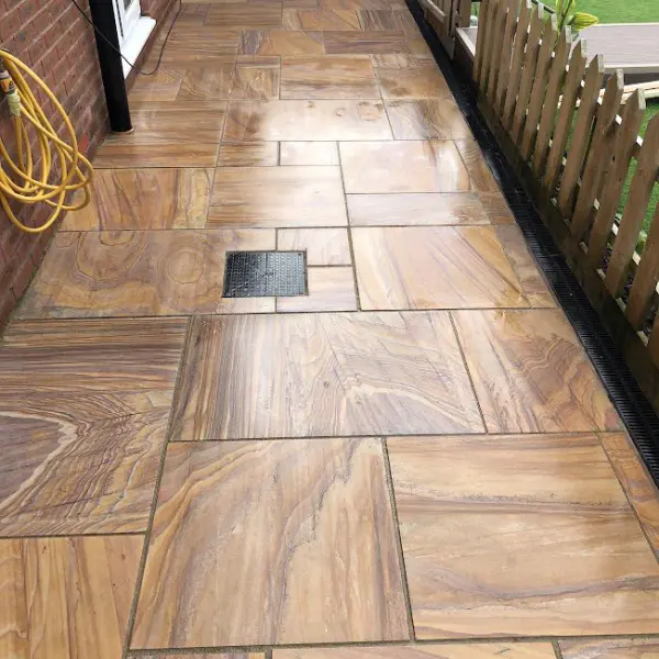Rainbow sandstone patio pristine and algae-free after HR Total Power Clean.