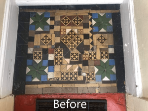 Close-up view of a Victorian tiled porch in need of cleaning and repair.