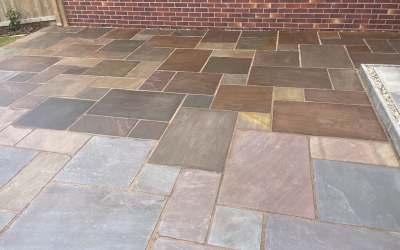 Can Wet Look Patio Sealer be applied over an existing sealer ?