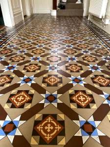 Fully restored Victorian tiled floor by Hardfloor Restoration Ltd., with intricate patterns and vibrant colors.