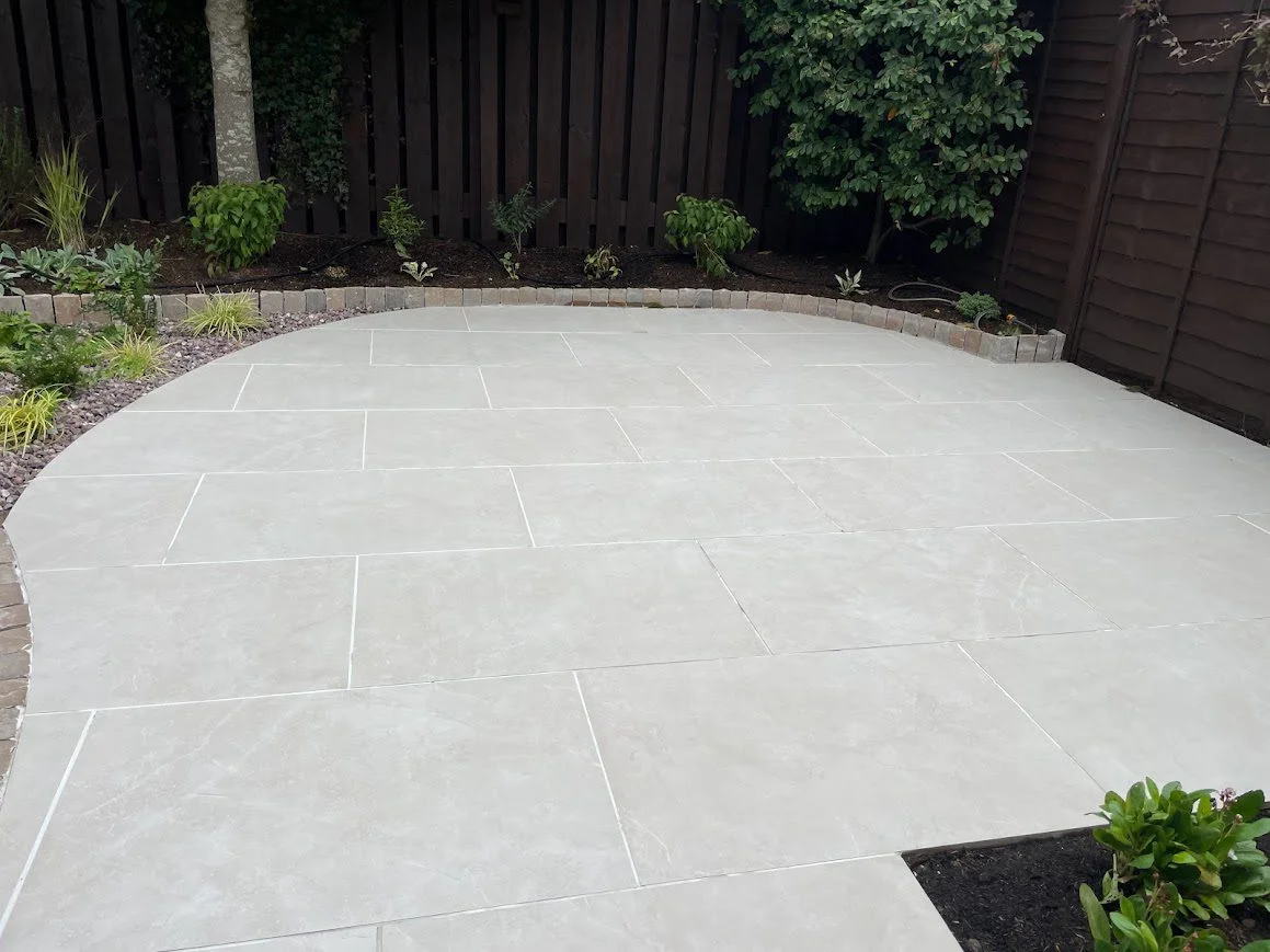 The same outdoor porcelain patio tiles now immaculately clean after using HR Total Power Clean.
