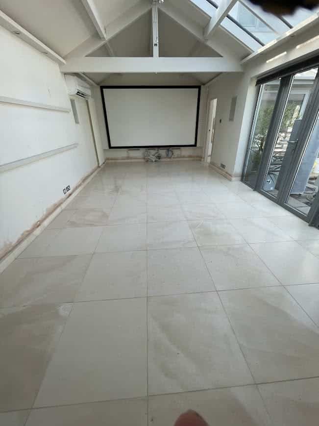 Limestone floor tiles selected and installed in a Manchester property