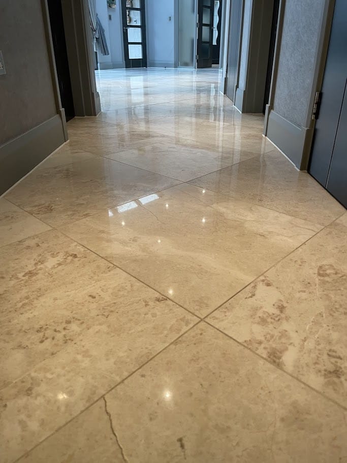 Vibrantly sealed dusty black limestone patio with striking color pop post-treatment with HR Colour Enhancer.