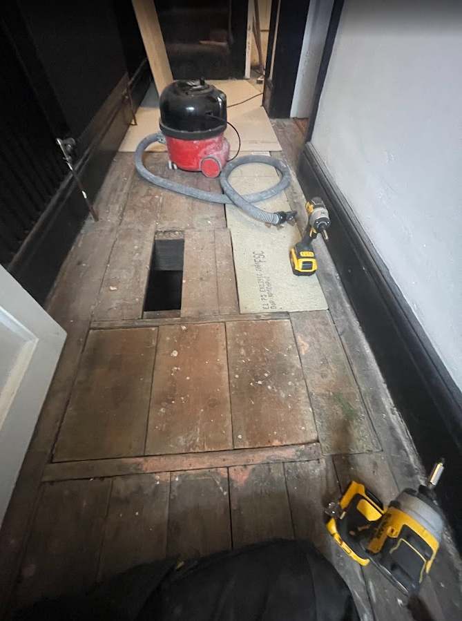 Hallway subfloor before professional tiling