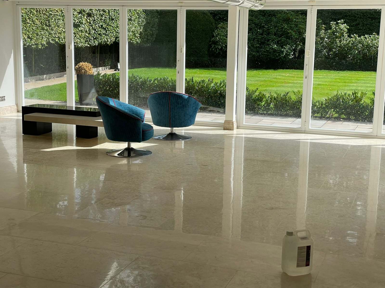 Polished marble floor restored and colour enhanced in a Manchester home