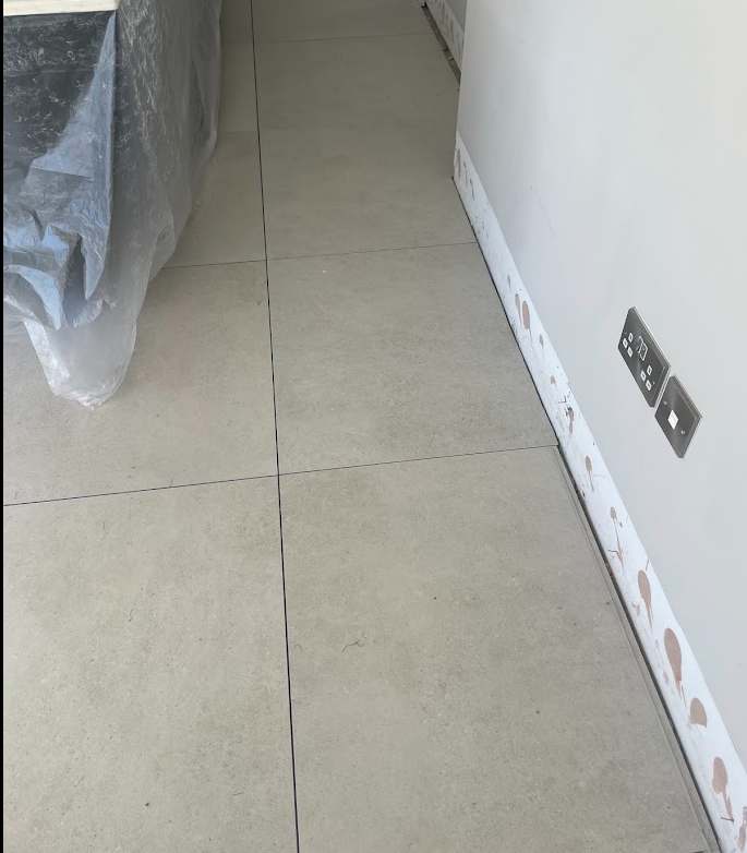 Porcelain floor tiles fully replaced and aligned