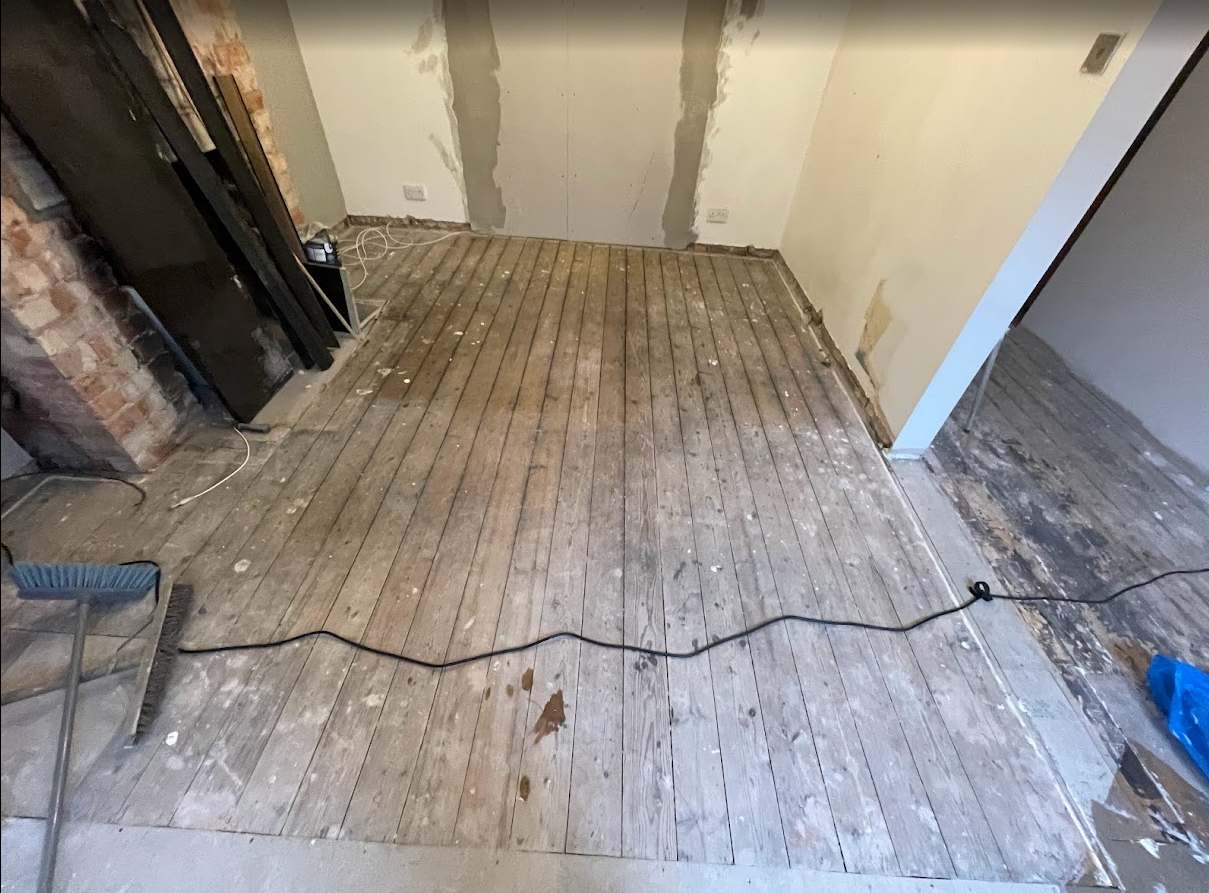 Floor before underfloor heating and tile installation