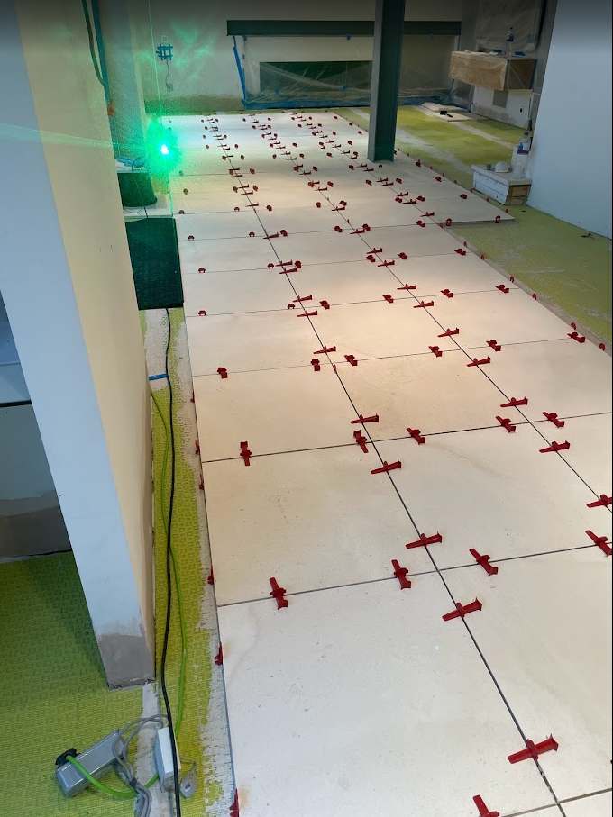Floor tiling in progress in Manchester