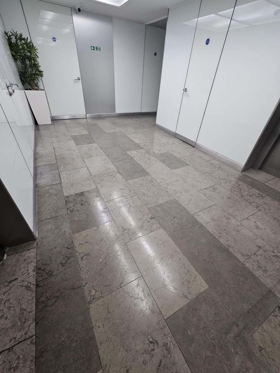 Restored limestone lift entrance at West Tower